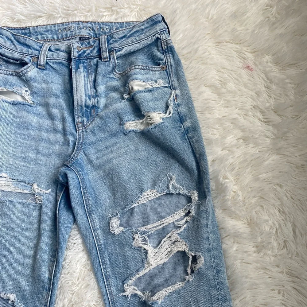 AE Strigid Distressed Light Blue Denim Jeans.  NWOT.